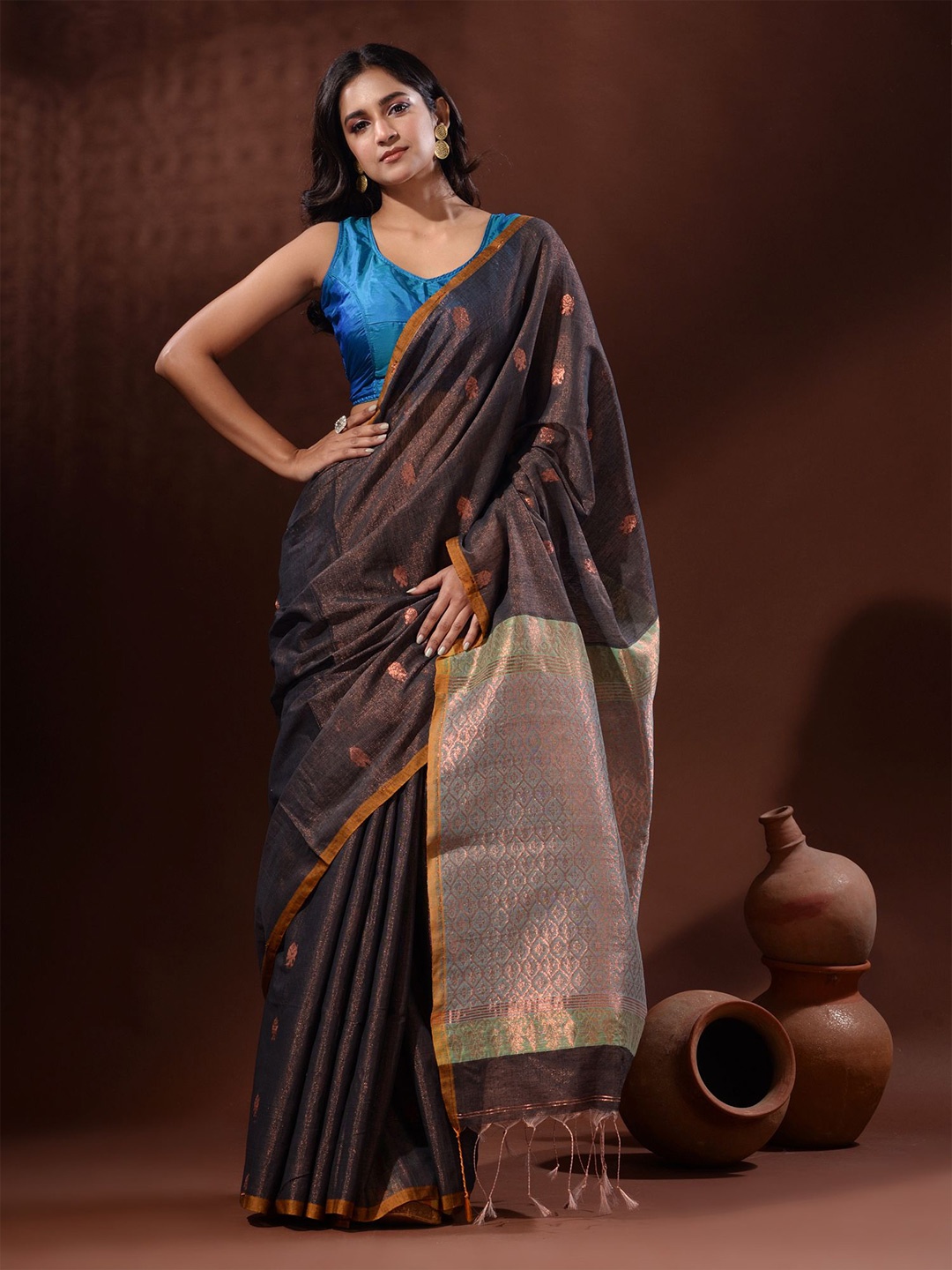 

Charukriti Woven Design Zari Tissue Saree, Copper