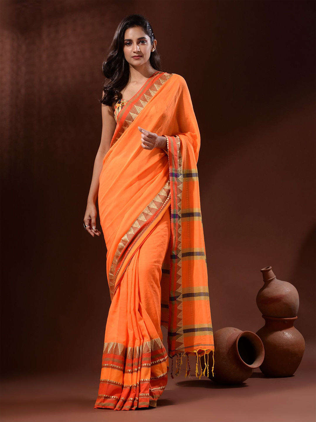 

Charukriti Orange & Gold-Toned Zari Pure Cotton Saree