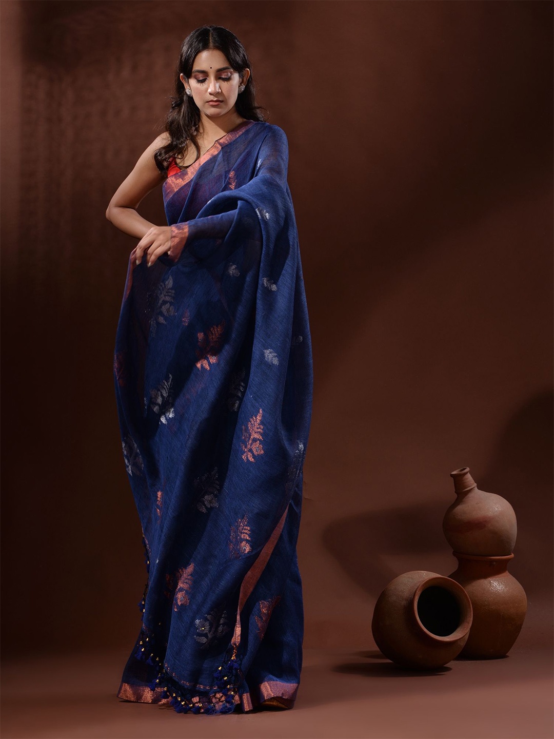 

Charukriti Woven Design Zari Pure Linen Saree, Navy blue