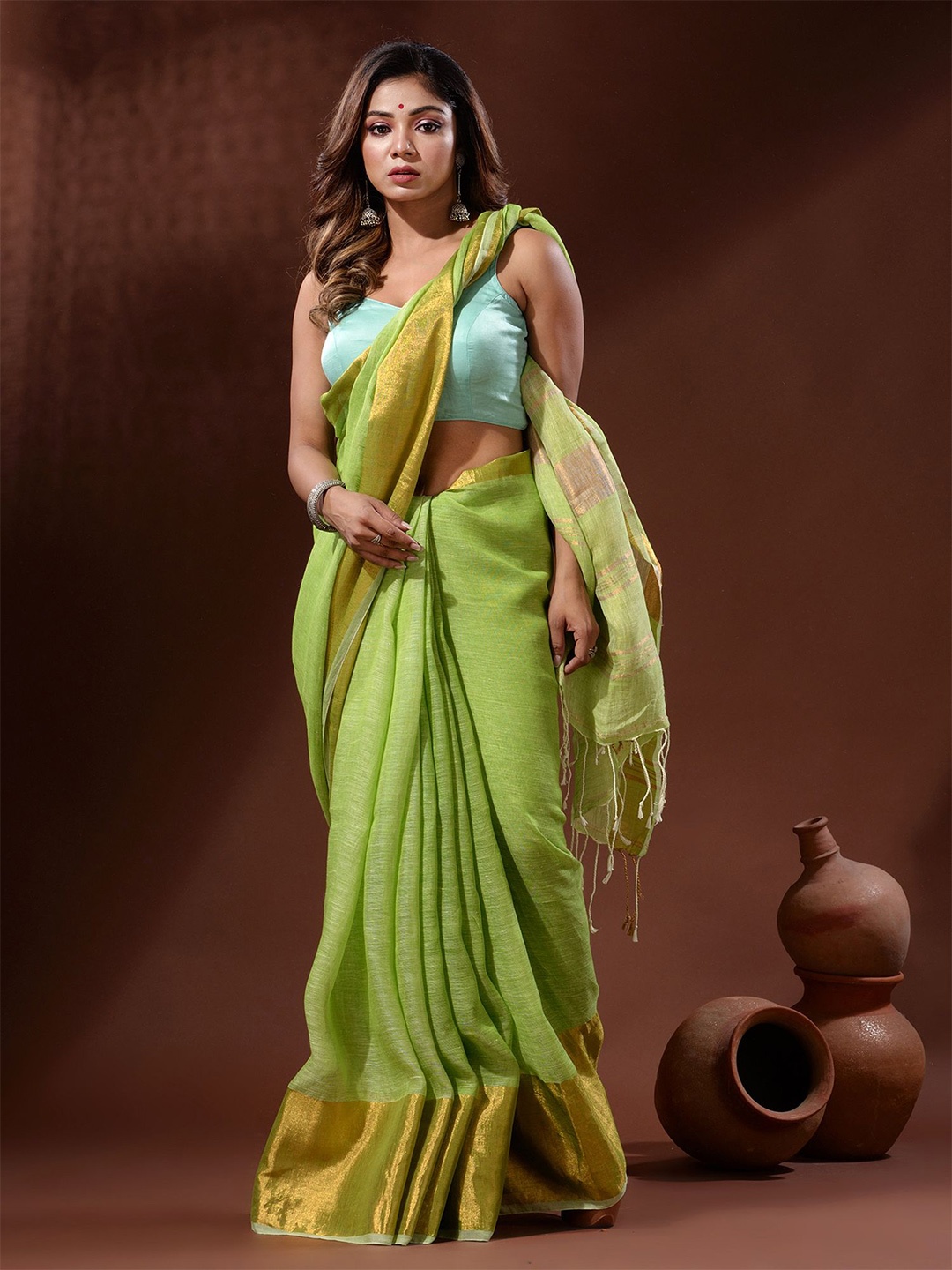 

Charukriti Zari Pure Linen Saree, Green