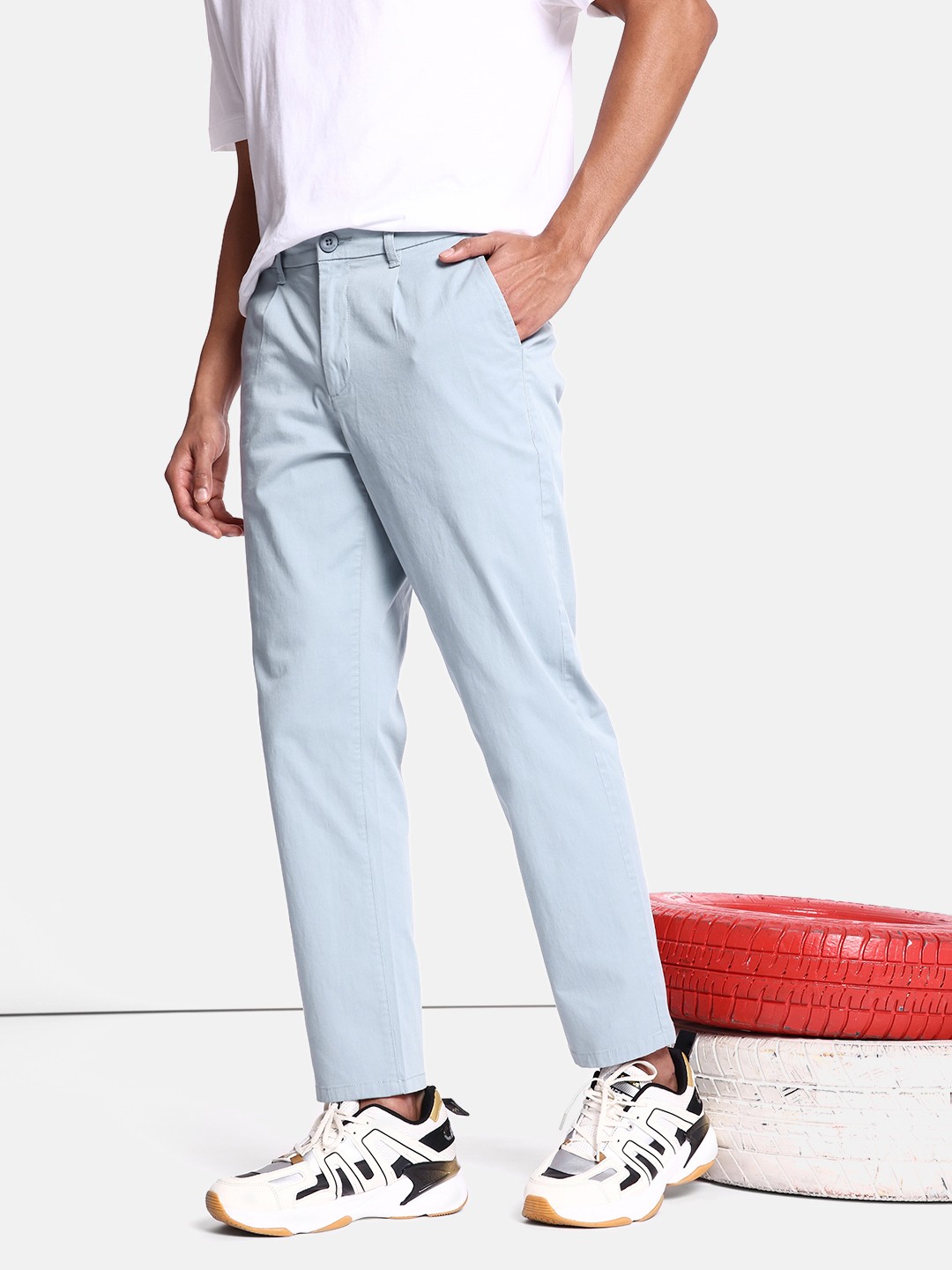 

The Roadster Lifestyle Co. Men Solid Pleated Mid-Rise Chinos Trousers, Blue