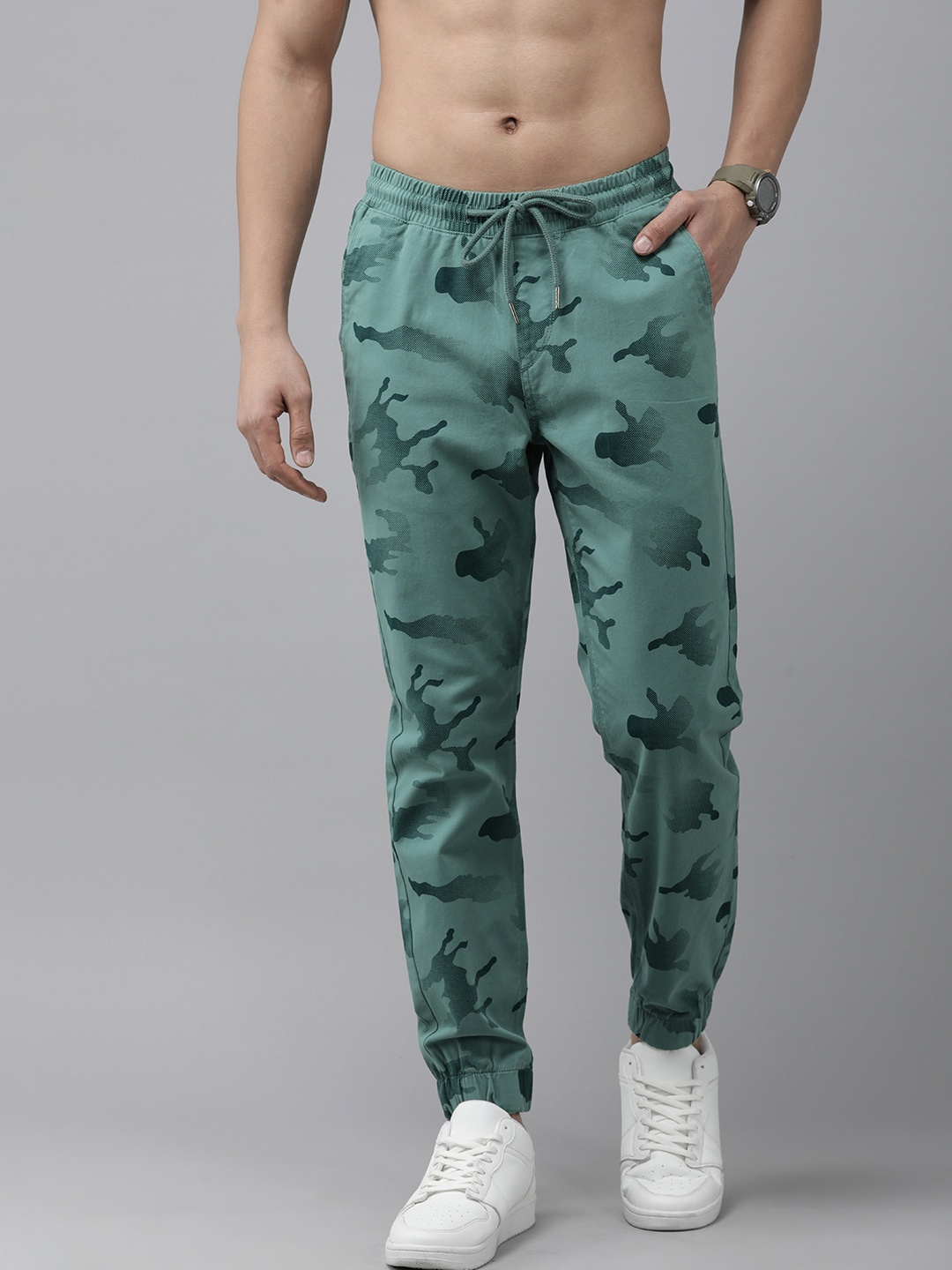 

The Roadster Lifestyle Co. Men Camouflage Printed Pleated Joggers, Sea green