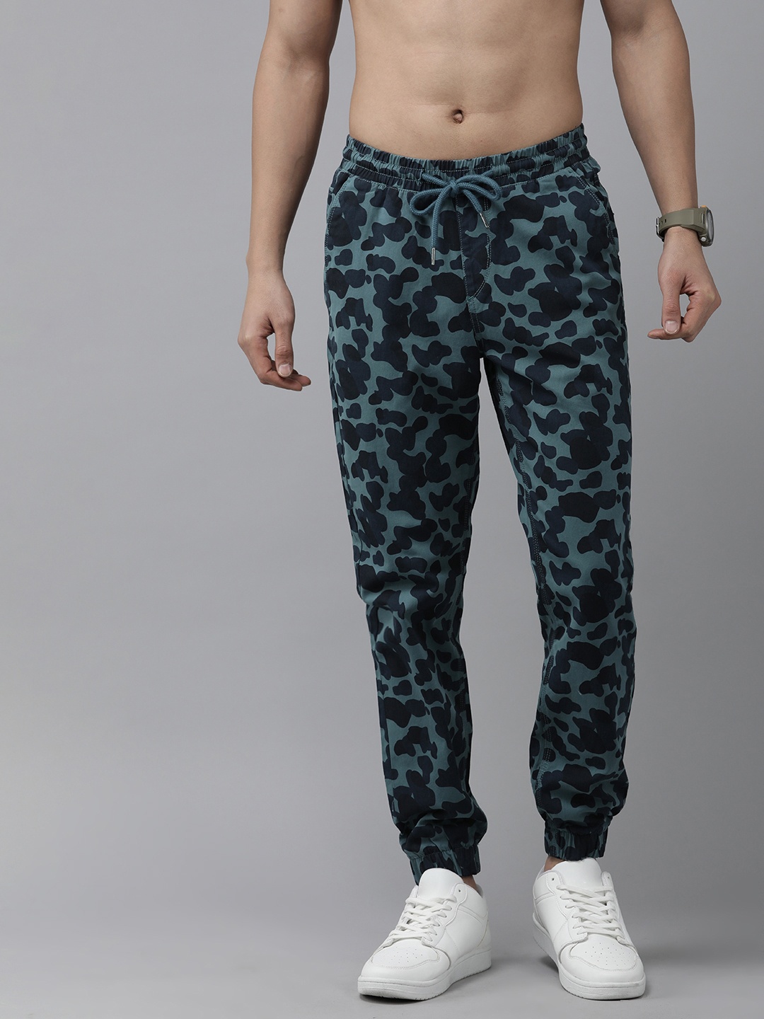 

The Roadster Lifestyle Co. Men Animal Printed Pleated Joggers, Blue