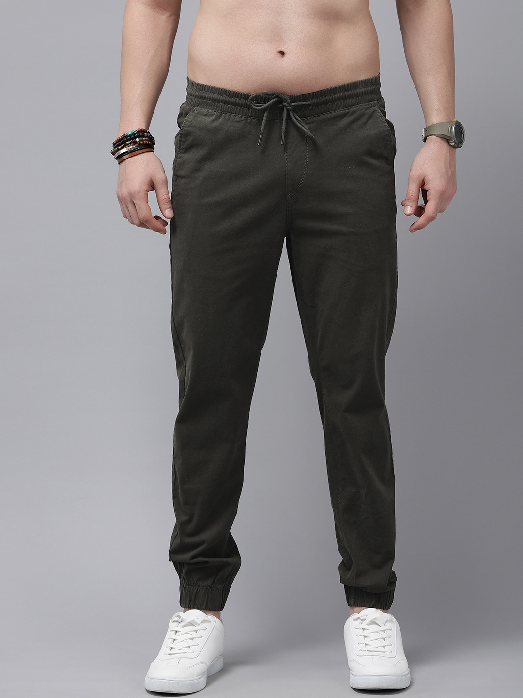 

The Roadster Lifestyle Co. Men Solid Jogger Trousers, Olive