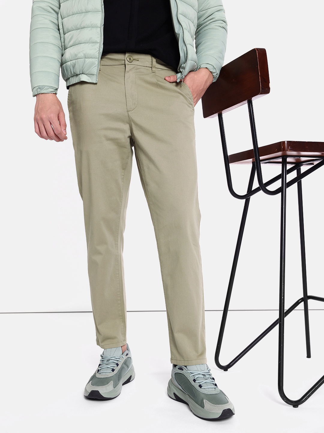 

The Roadster Lifestyle Co. Men Solid Pleated Mid-Rise Chinos Trousers, Green