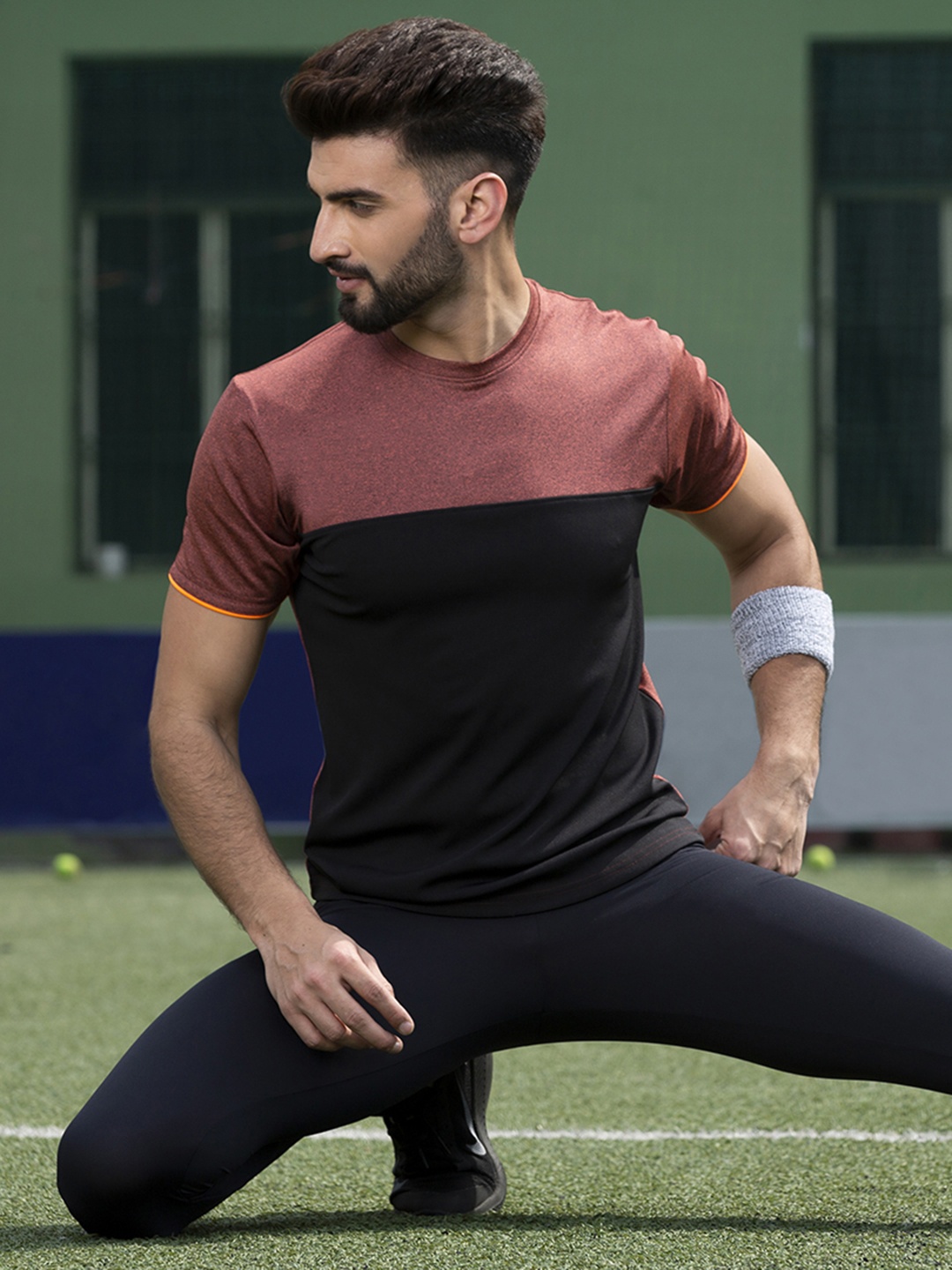 

CHKOKKO Men Colourblocked Dri-FIT T-shirt, Rust