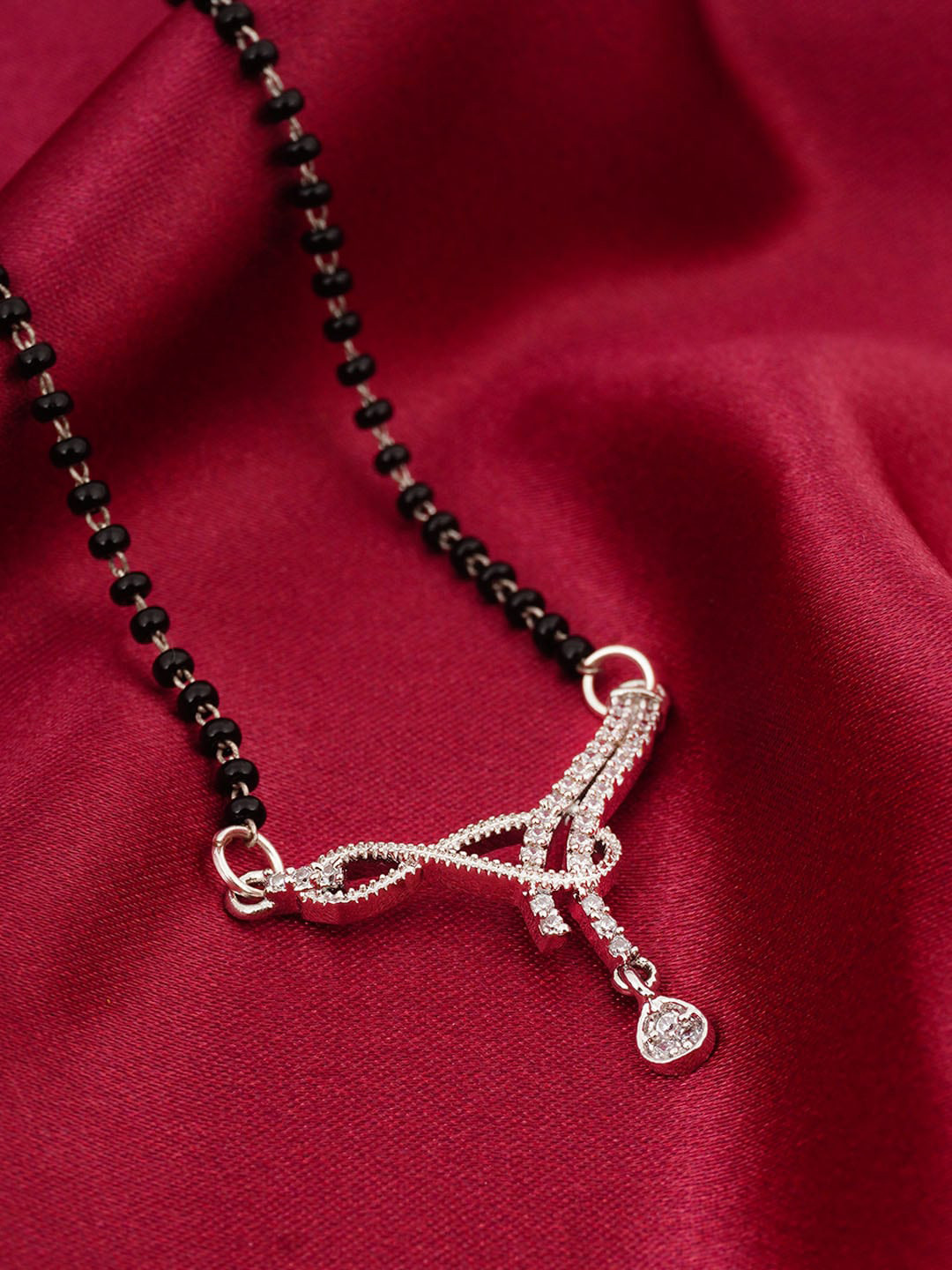 

Urmika Silver-Toned Stone-Studded & Beaded Mangalsutra