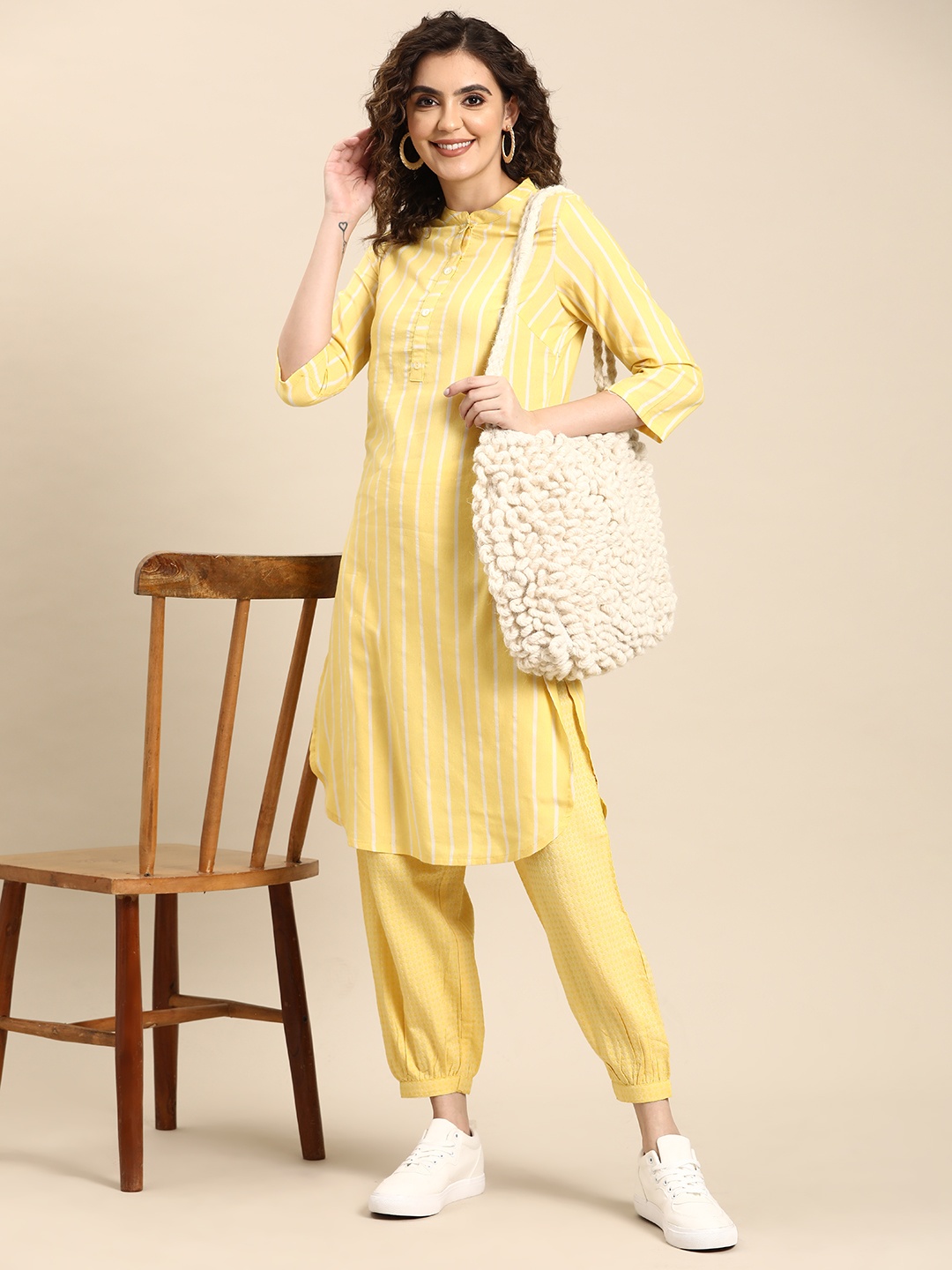 

Sangria Striped Regular Kurta with Salwar, Yellow