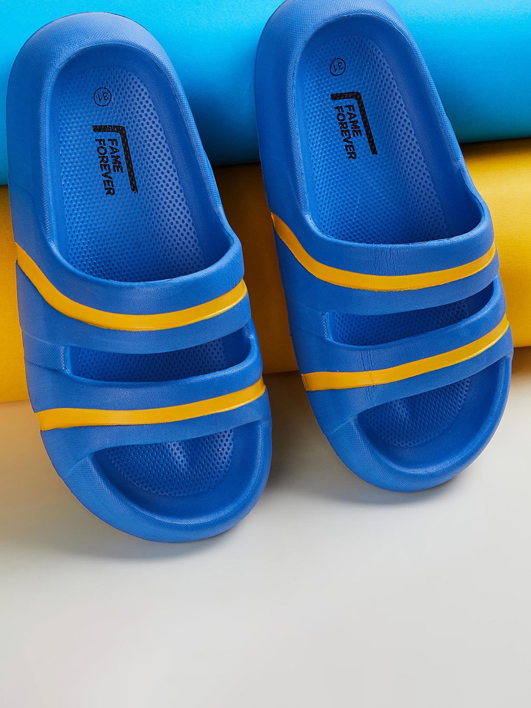 

Fame Forever by Lifestyle Boys Striped Rubber Sliders, Blue