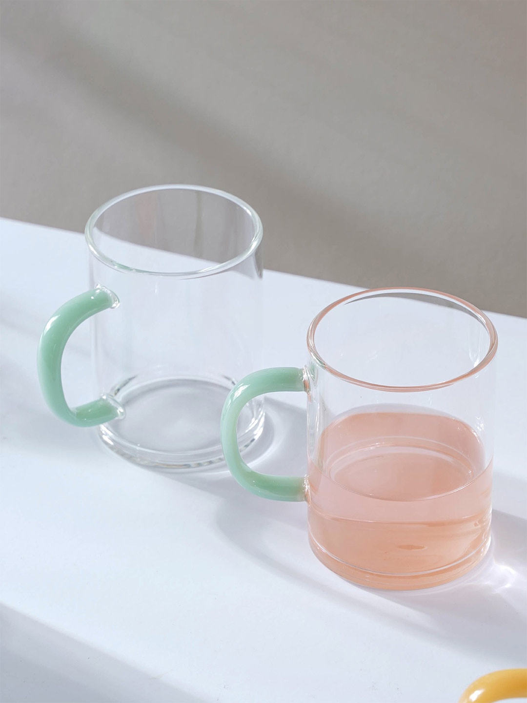 

Nestasia Transparent & Green 2 Pcs Solid Glass Mugs 220 ml Each