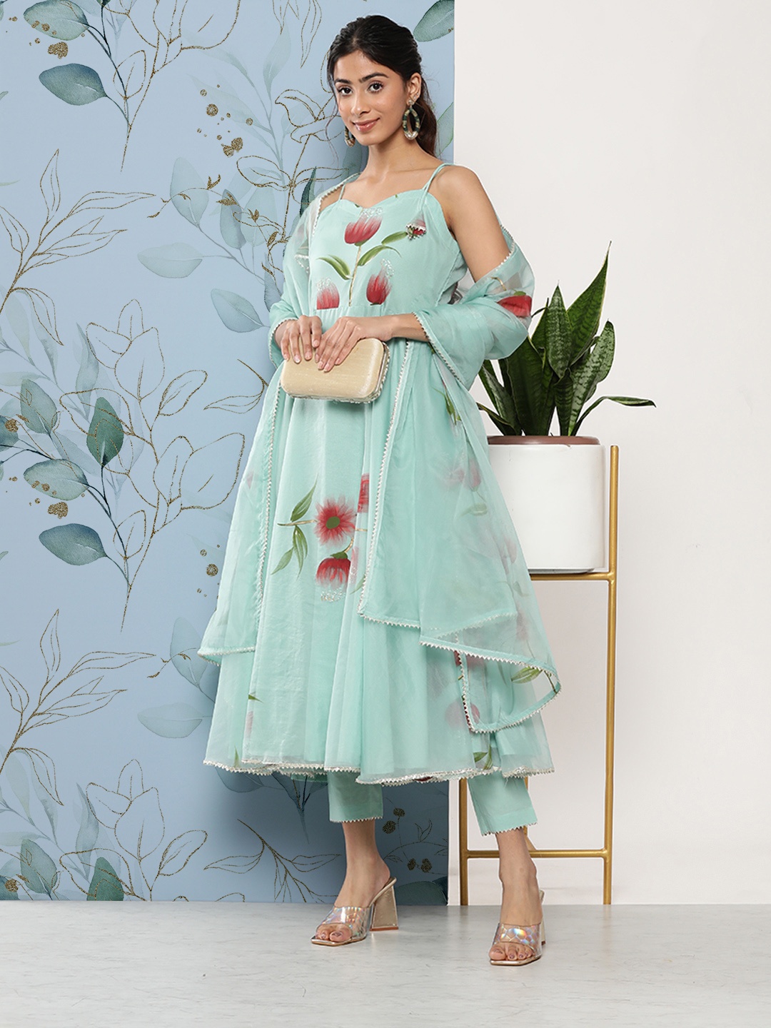 

Divena Women Floral Printed Gotta Patti Kurta with Trousers & With Dupatta, Turquoise blue