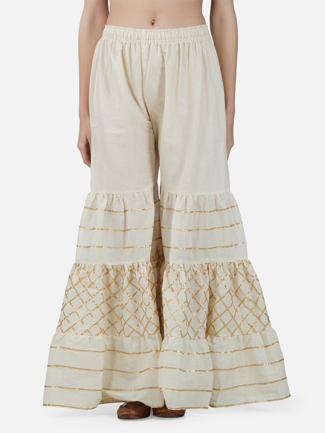 

BCZ Style Women Beige & Gold-Toned Flared Handloom Ethnic Palazzos
