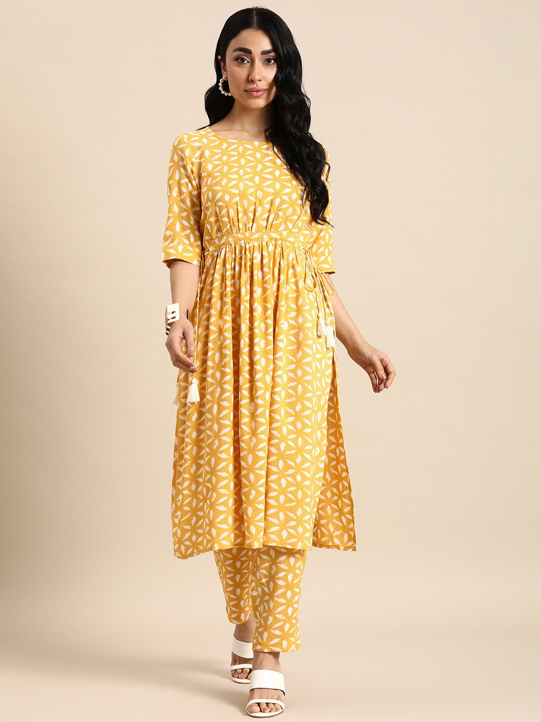 

Anouk Ethnic Motifs Printed High Slit Kurta with Trousers, Mustard