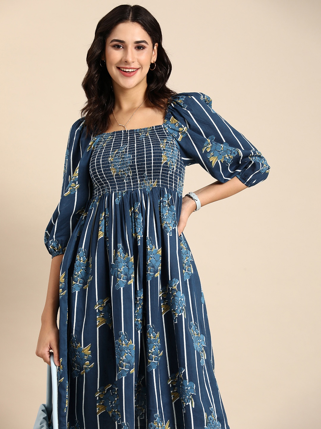 

Anouk Women Floral Printed Smocked Detail Empire Style Kurta with Palazzos, Navy blue