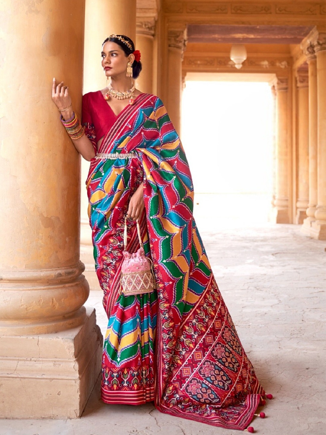 

Mitera Red & Blue Ethnic Motifs Pure Silk Patola Saree