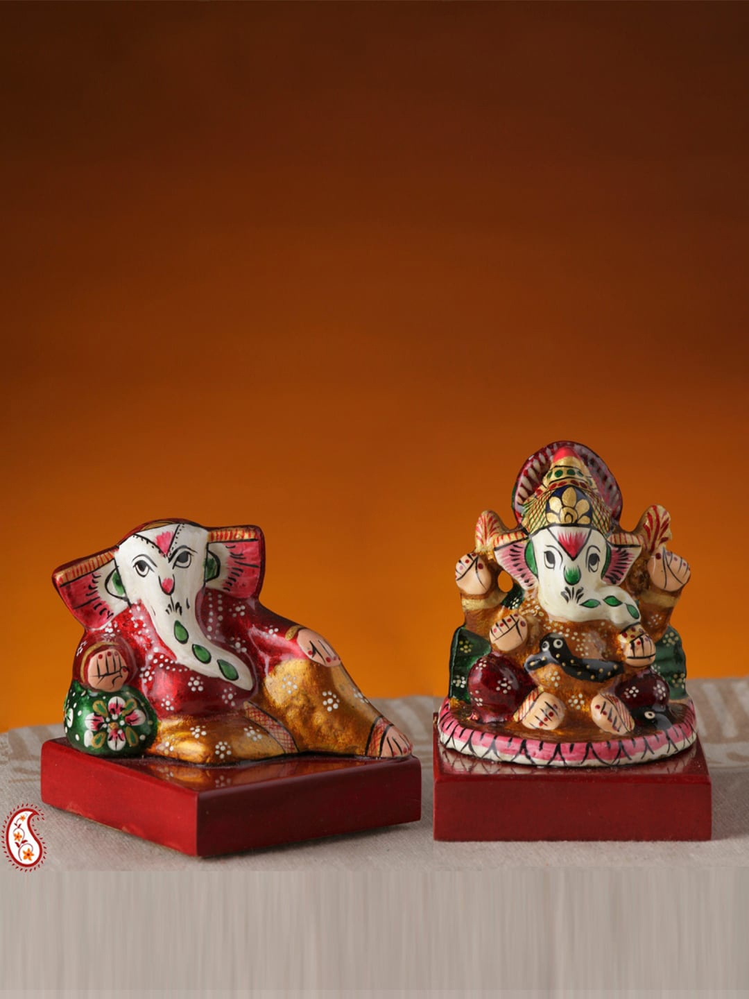 

Aapno Rajasthan 2 Pieces White & Yellow Ganapathi made in Enamelled Metal Showpieces