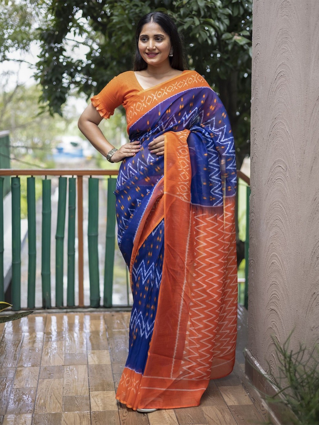 

Mitera Blue & Orange Ethnic Motifs Pure Cotton Banarasi Saree