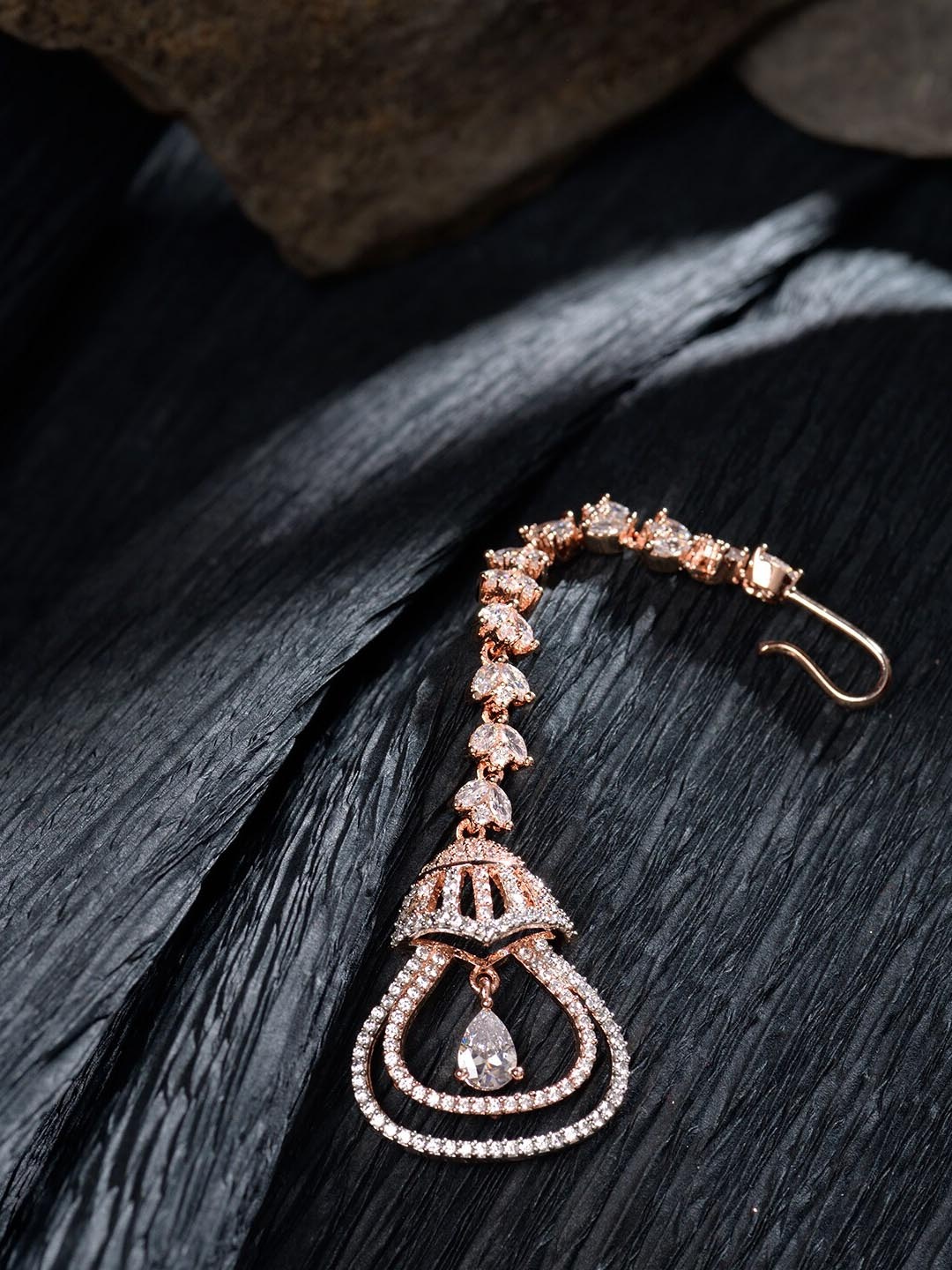 

Saraf RS Jewellery Rose Gold-Plated AD Stone-Studded Bell Shaped Maang Tikka, White