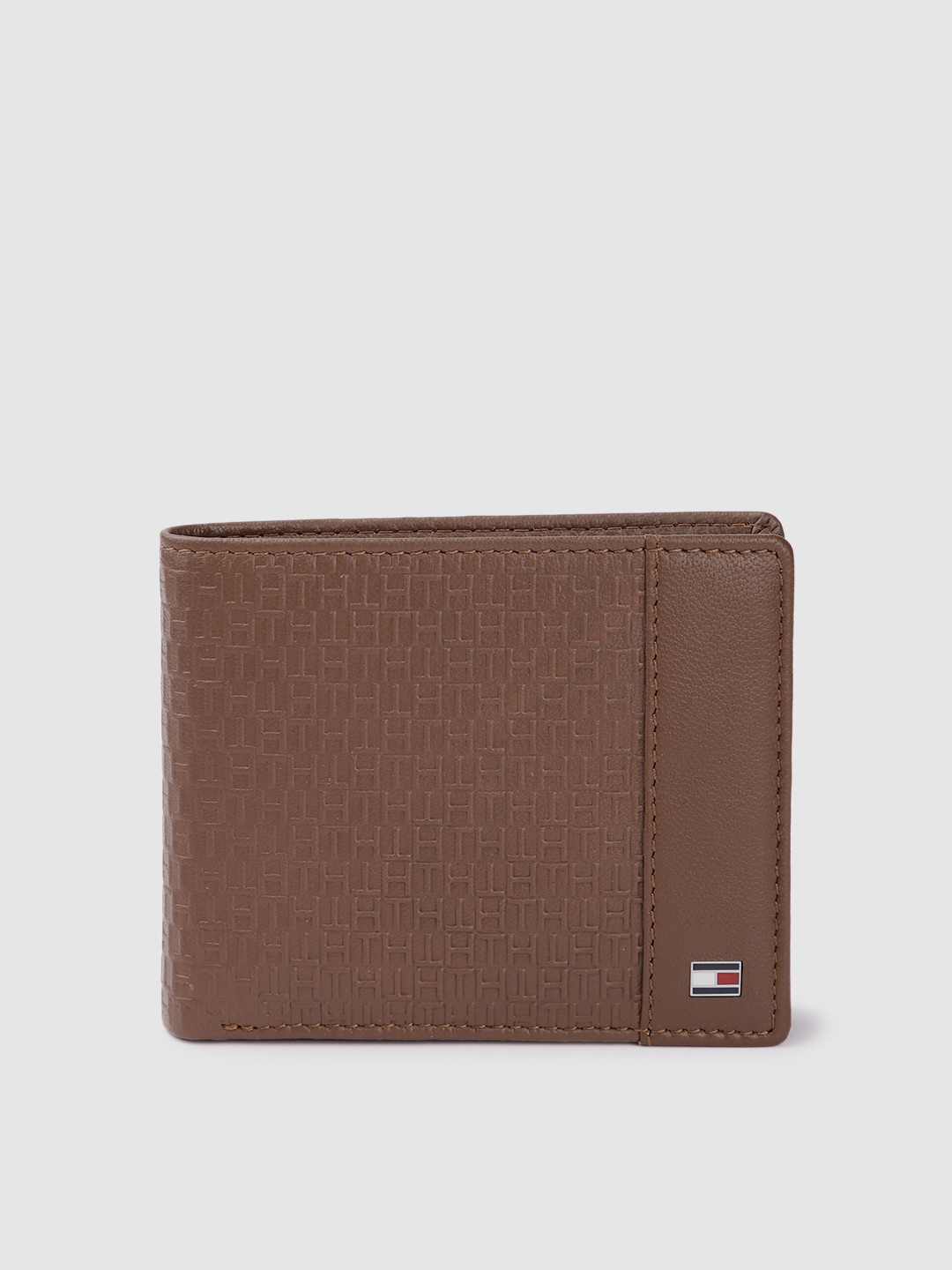 

Tommy Hilfiger Men Tan Leather Two Fold Wallet