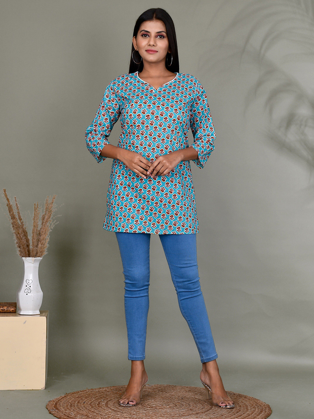 

Kesarya Turquoise Blue Ethnic Motifs Printed V-Neck Pure Cotton Kurti