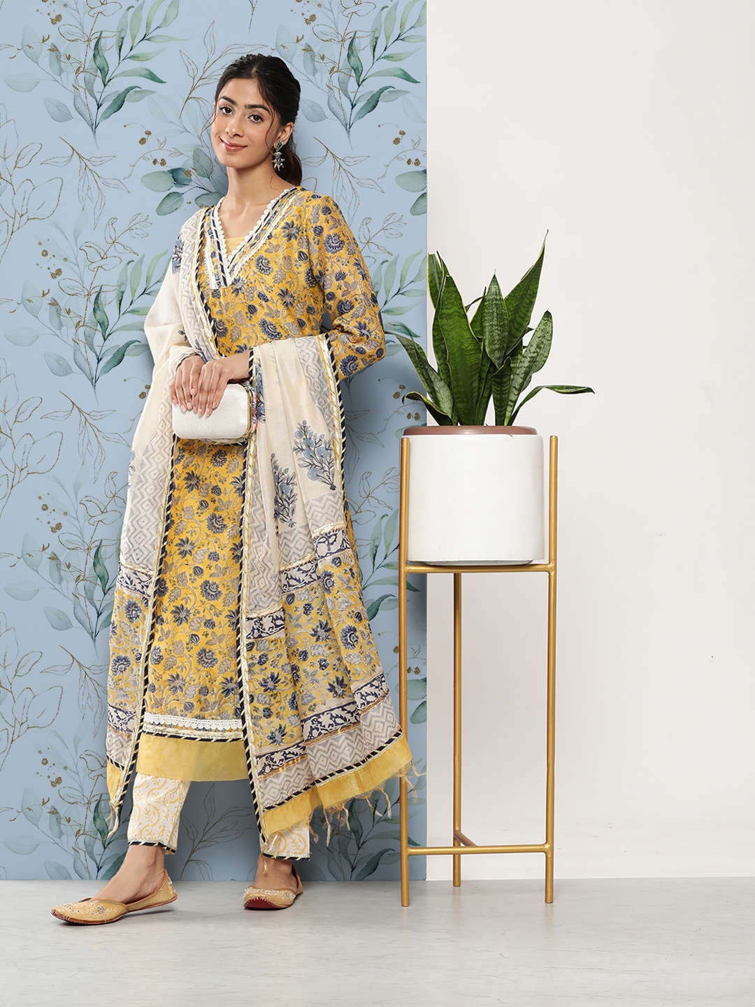 

Divena Women Floral Printed Gotta Patti Chanderi Silk Kurta with Trousers & With Dupatta, Mustard