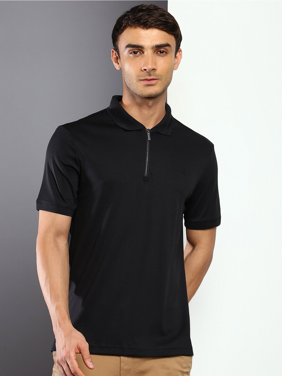 

Calvin Klein Jeans Men Black Polo Collar Pure Cotton T-shirt