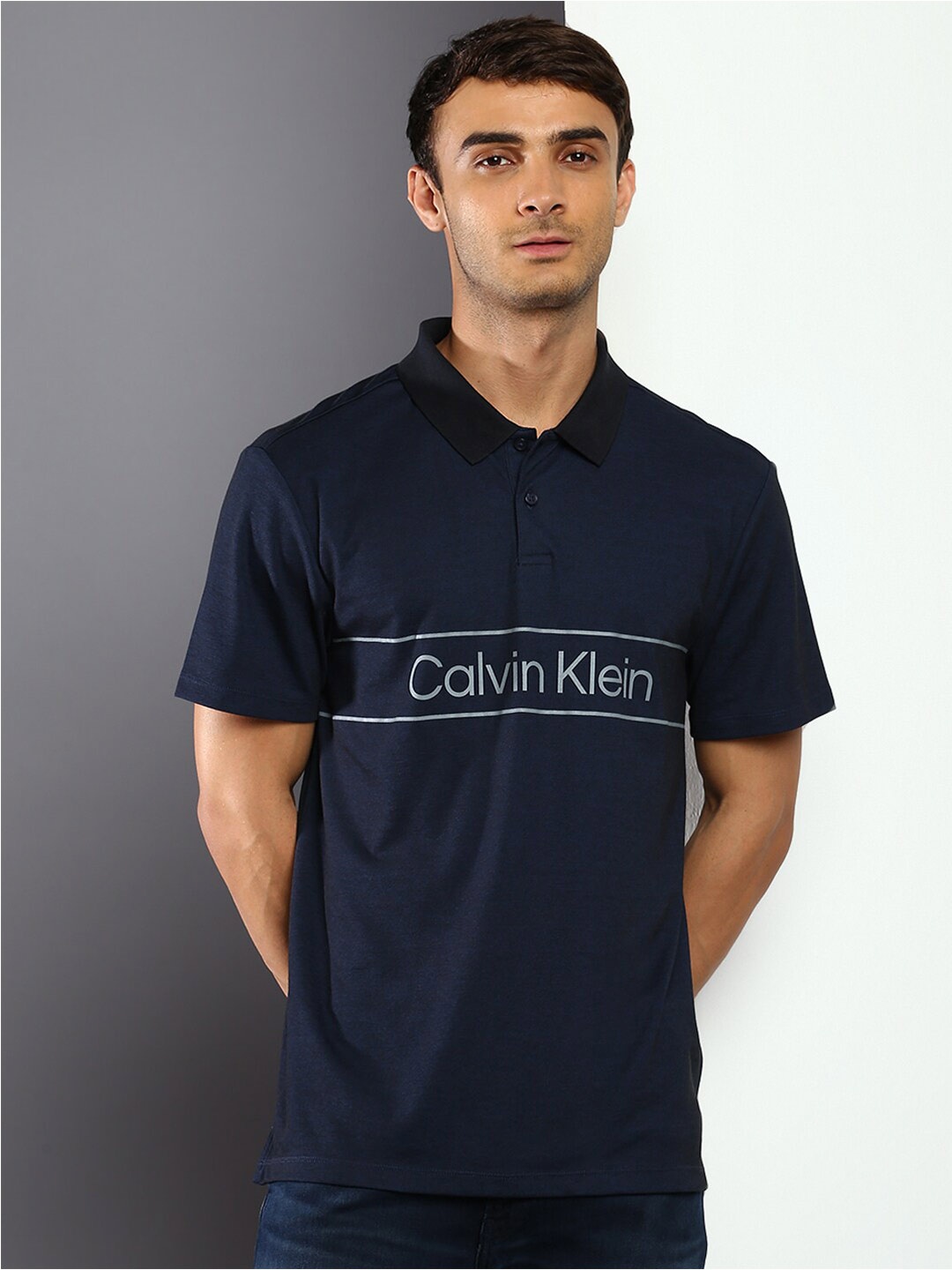

Calvin Klein Jeans Men Typography Printed Cotton Polo Collar T-shirt, Navy blue