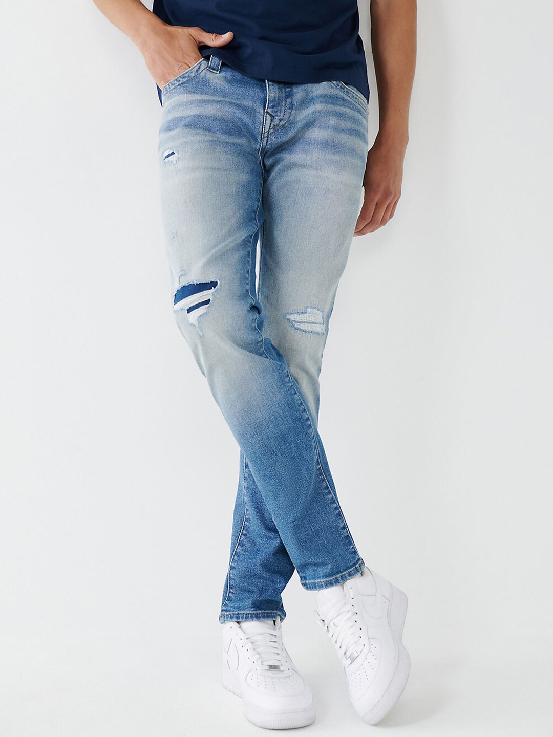 

True Religion Men Skinny Fit Mildly Distressed Heavy Fade Jeans, Blue