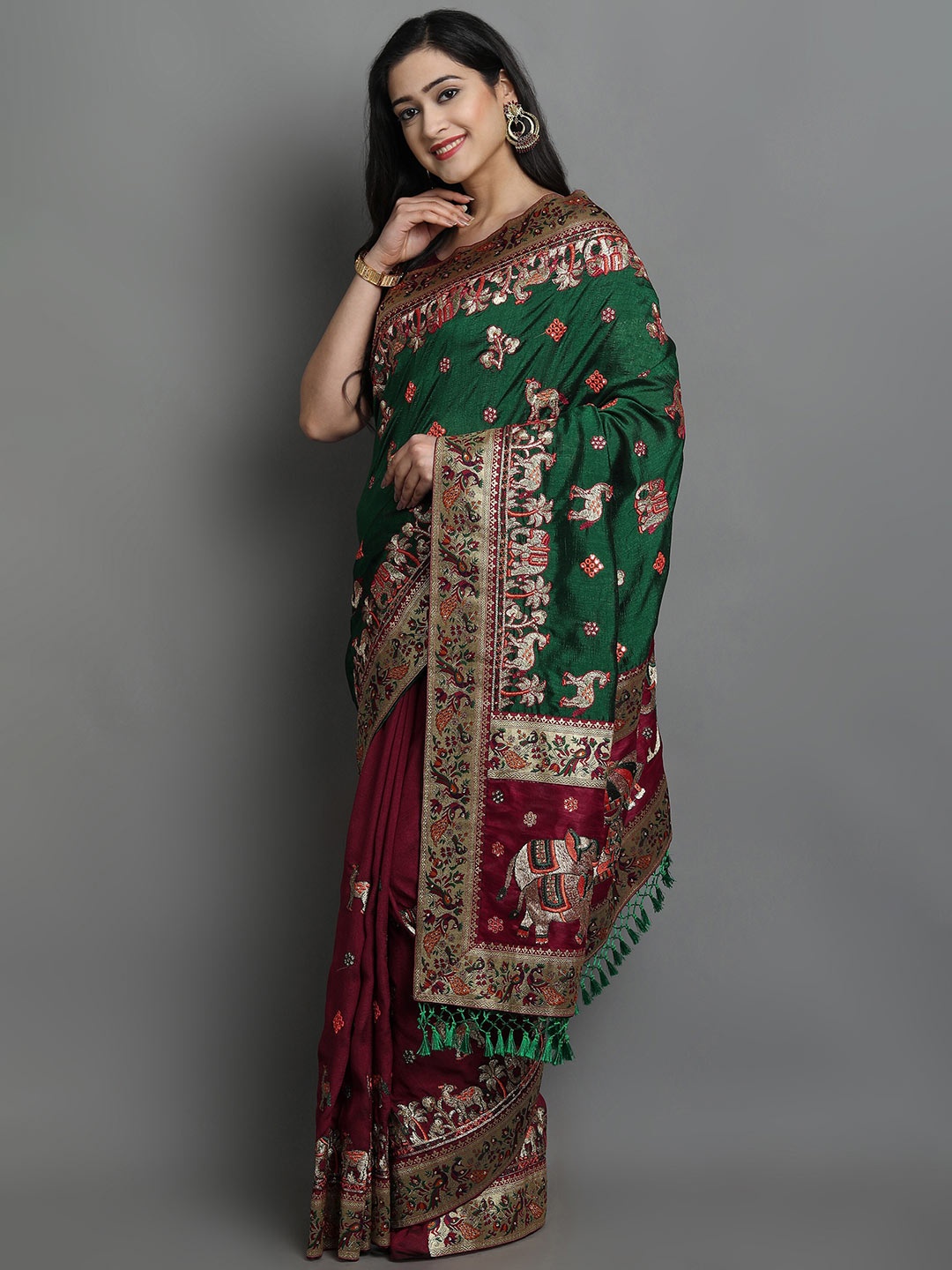 

Ekta Textiles Green & Maroon Ethnic Motifs Embroidered Silk Blend Half and Half Patola Saree