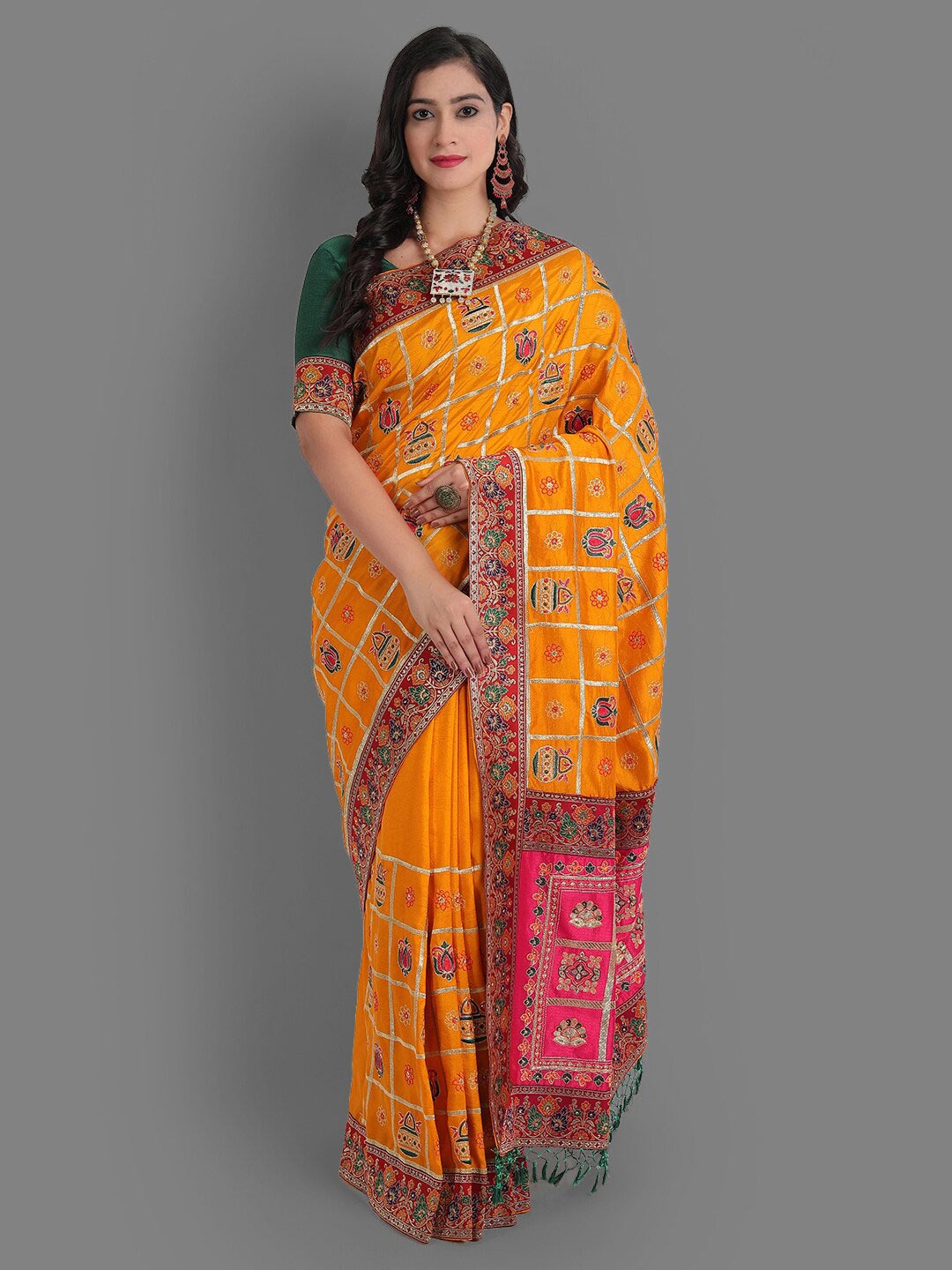 

Ekta Textiles Yellow & Peach-Coloured Ethnic Motifs Embroidered Silk Blend Patola Saree