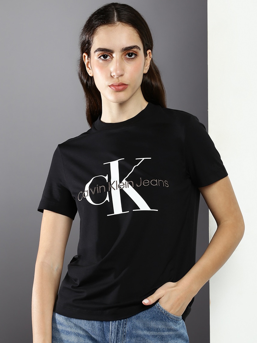 

Calvin Klein Jeans Women Round Neck Brand Logo Printed Cotton T-shirt, Black