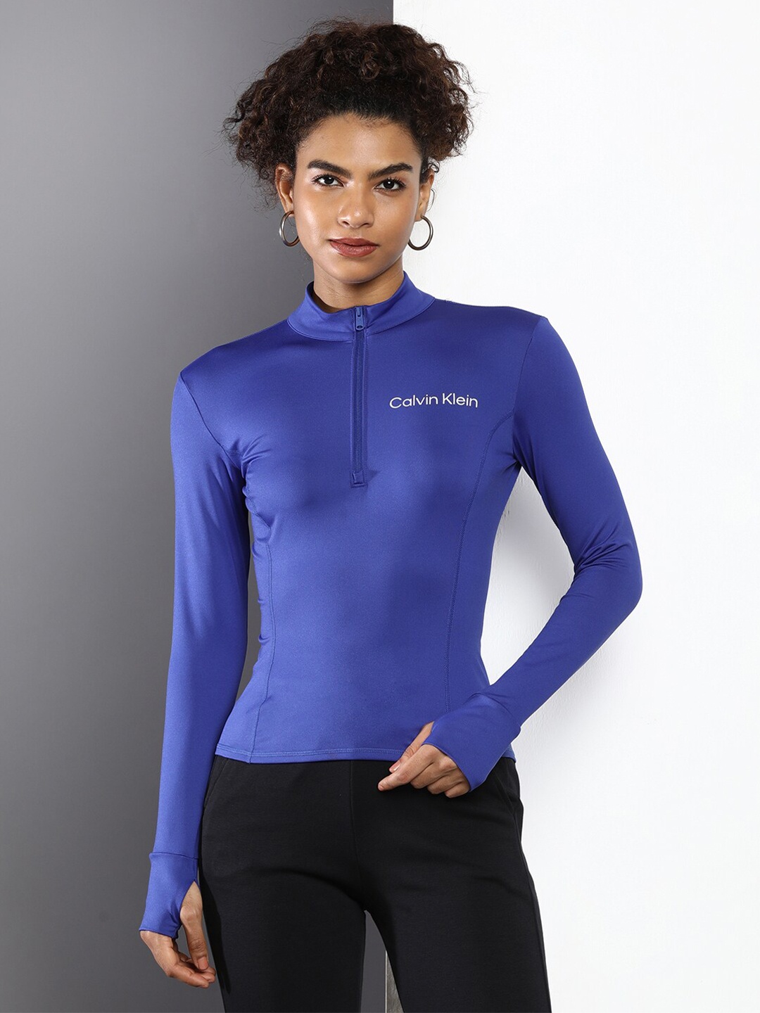 

Calvin Klein Jeans Women Mandarin Collar Compression Fit T-shirt, Blue