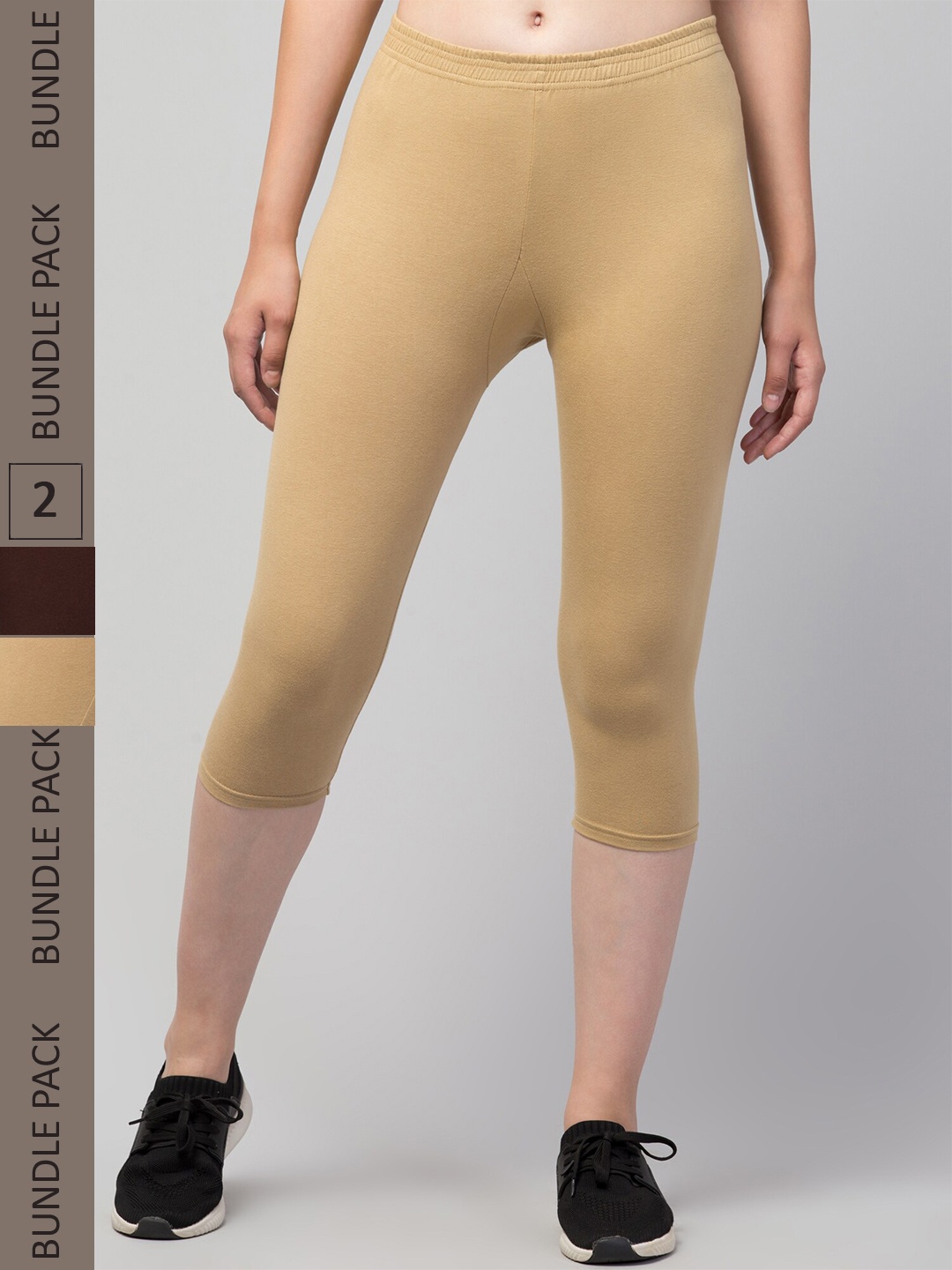 

Apraa & Parma Women Beige & Brown Skinny Fit Capris