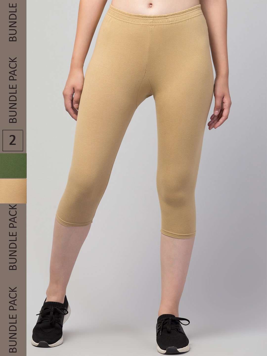 

Apraa & Parma Women Beige & Green Skinny Fit Capris