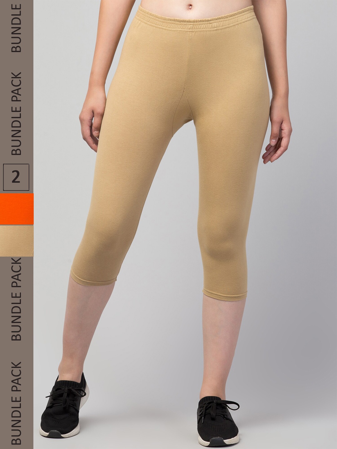 

Apraa & Parma Women Beige & Orange Skinny Fit Capris