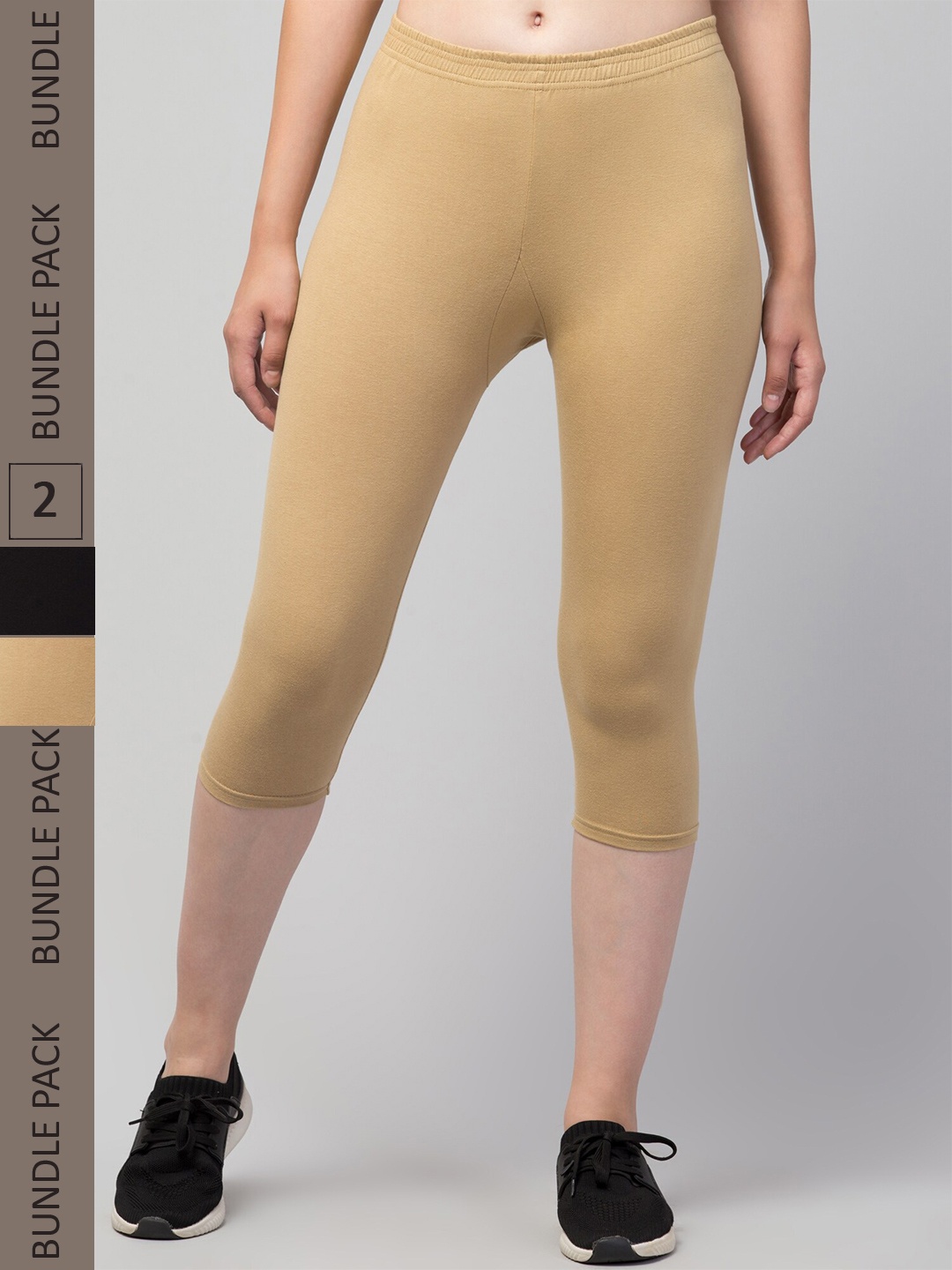 

Apraa & Parma Women Beige & Black Skinny Fit Capris