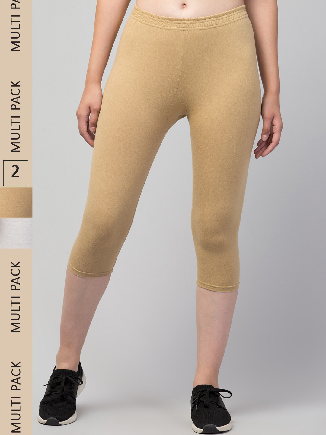 

Apraa & Parma Women Beige & White Skinny Fit Capris