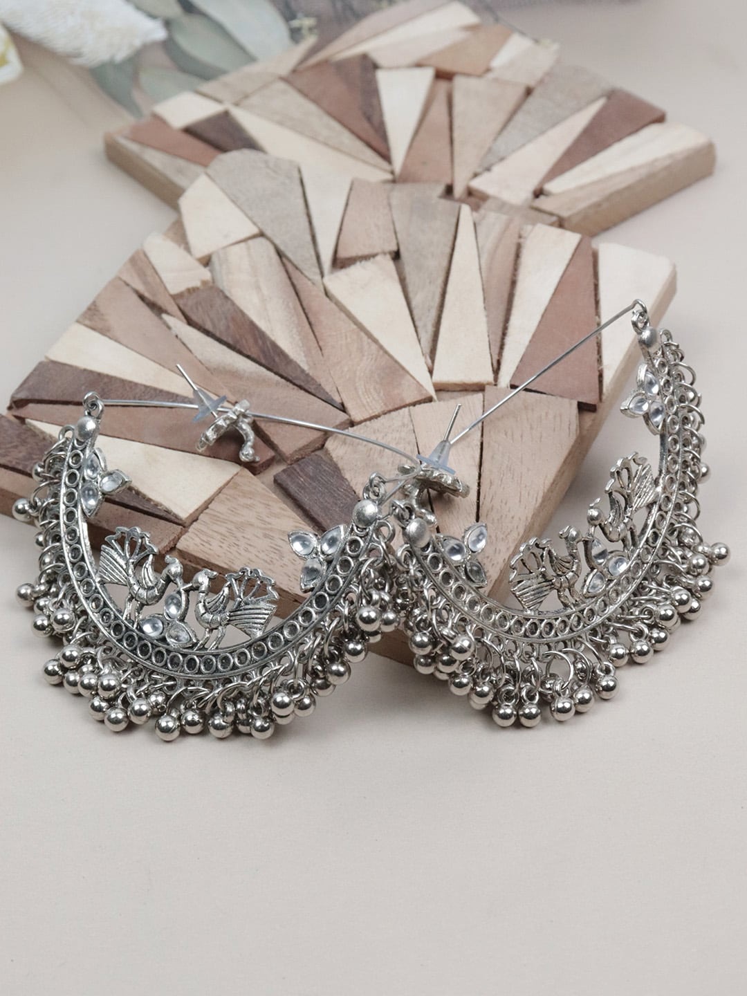 

VAGHBHATT Silver-Plated Peacock Shaped Chandbalis