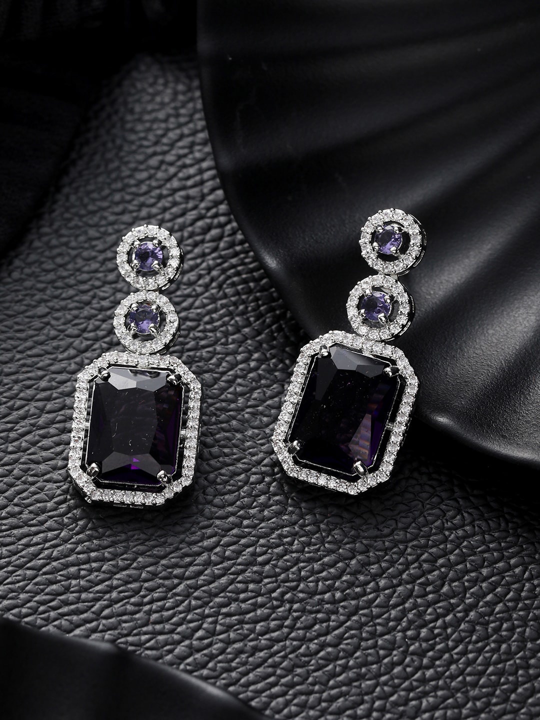 

Jazz and Sizzle Silver-Plated American Diamond Studded Drop Earrings, Purple