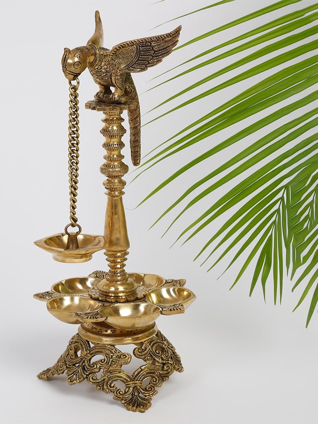 

Fabindia Mehnoor Engraved Bird Floor Lamp With Hanging Diya, Gold