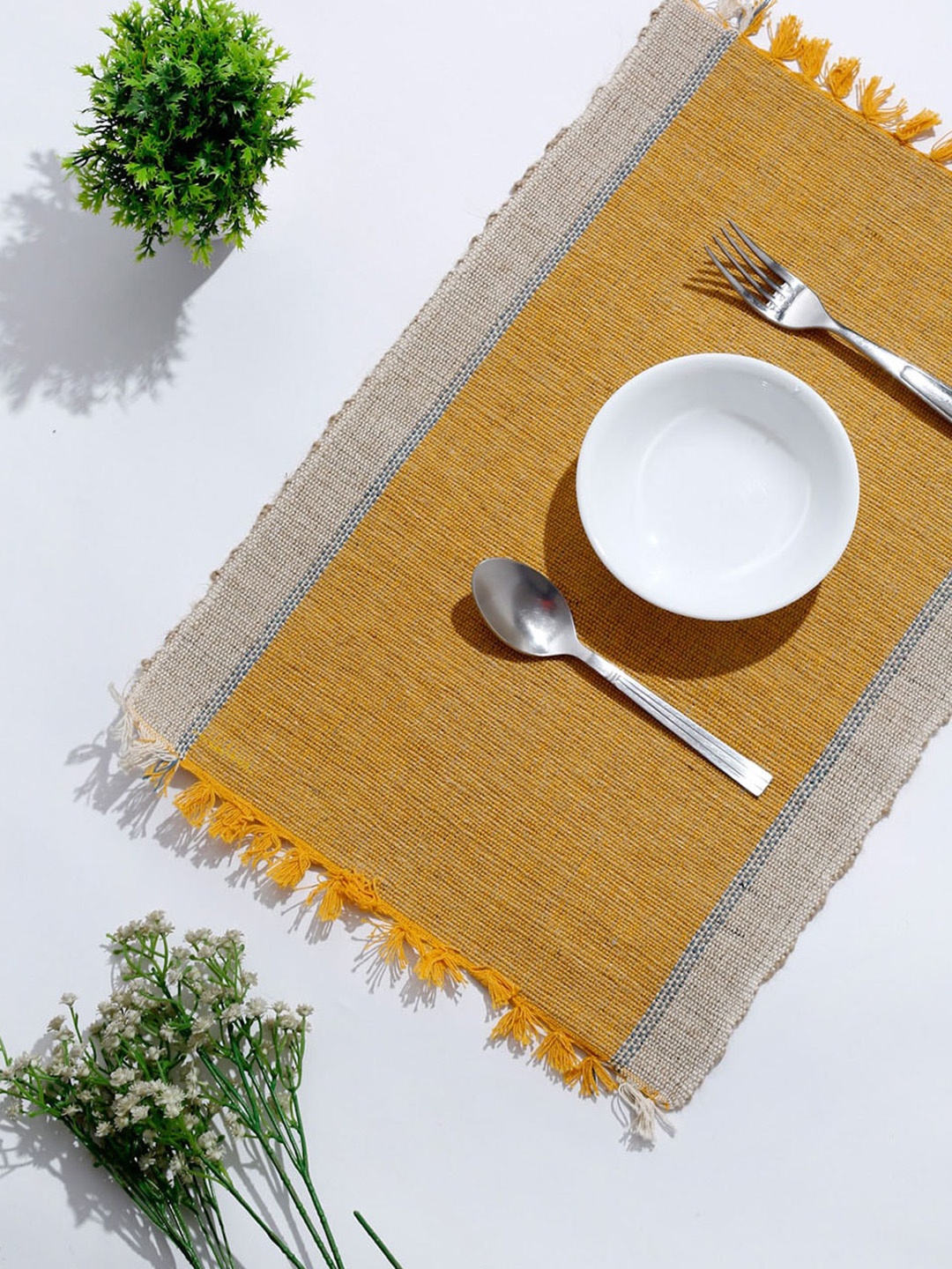 

Fabindia Tapish 6 Pcs Yellow & Beige Textured Cotton Table Placemats
