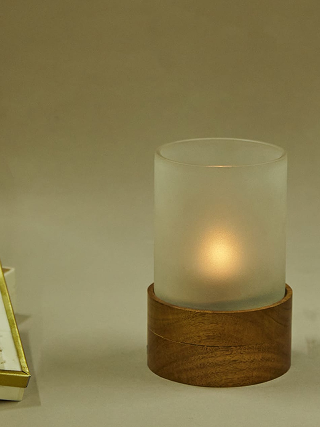 

Fabindia Jyotirmaya White Solid T-Lite Small Candle Holder