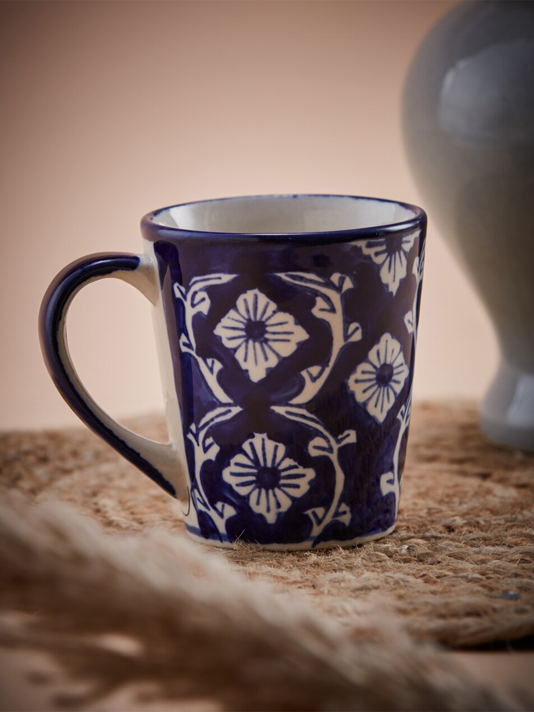 

Fabindia Syamika Blue & White Printed Ceramic Glossy Coffee Mug 240 ml