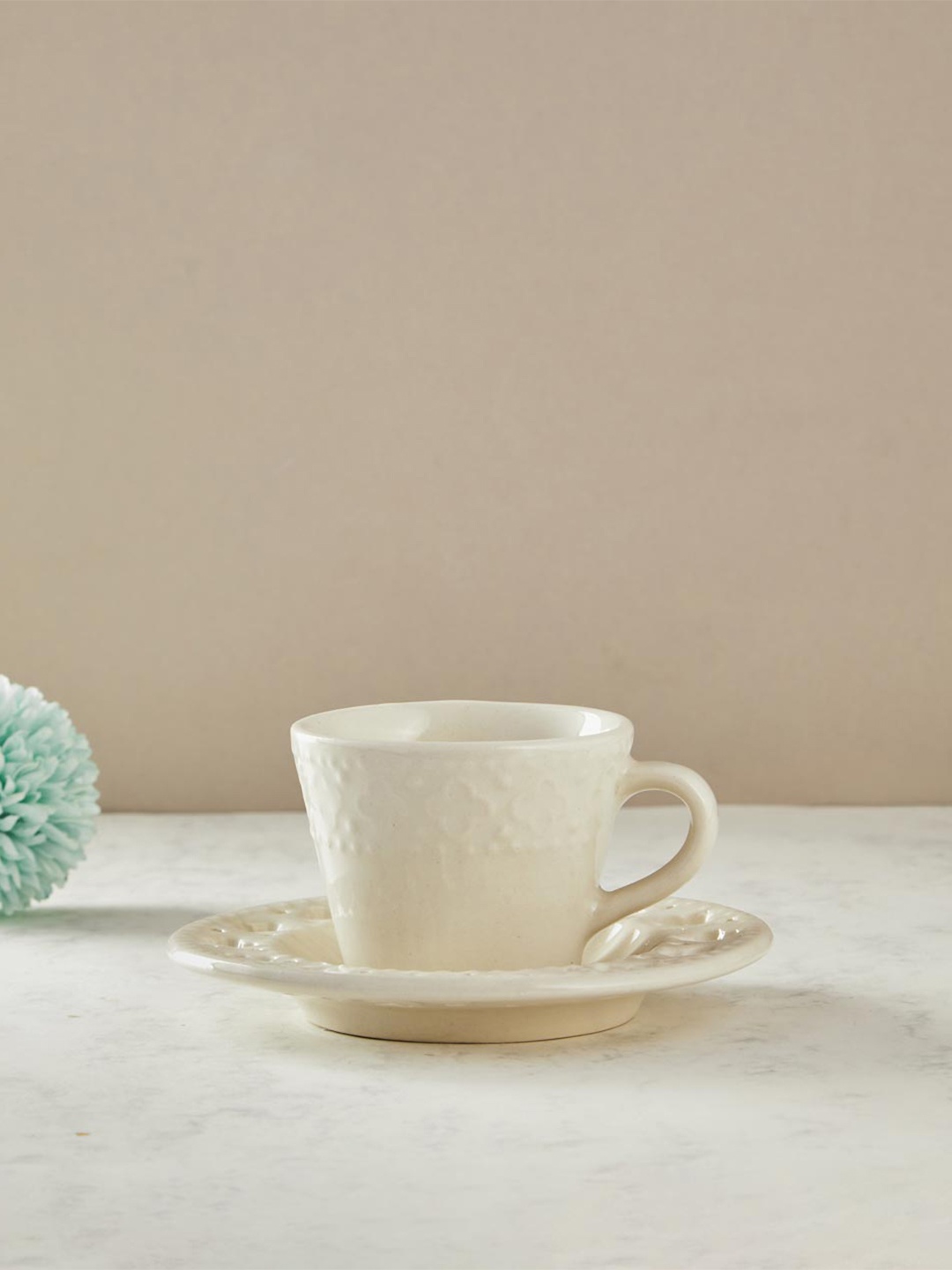 

Fabindia Aakarik 2 Pieces White Textured Ceramic Glossy Cups and Saucer