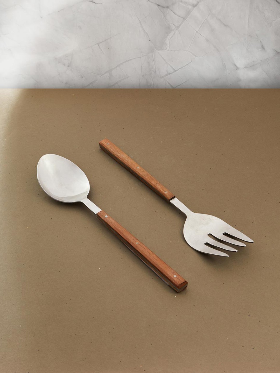 

Fabindia Aakarik 2-Pcs Brown Stainless Steel Serving Spoon and Fork