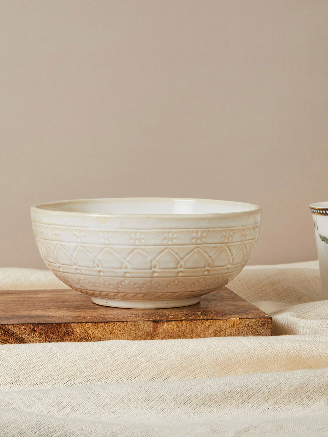 

Fabindia Idika White Textured Ceramic Serving Bowl