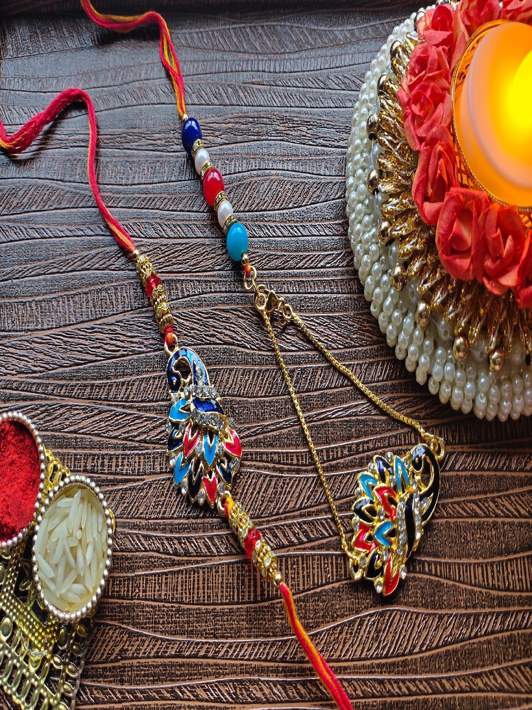 

Mahi Set Of 2 Peacock Shaped Bhaiya Bhabhi Rakhi, Blue