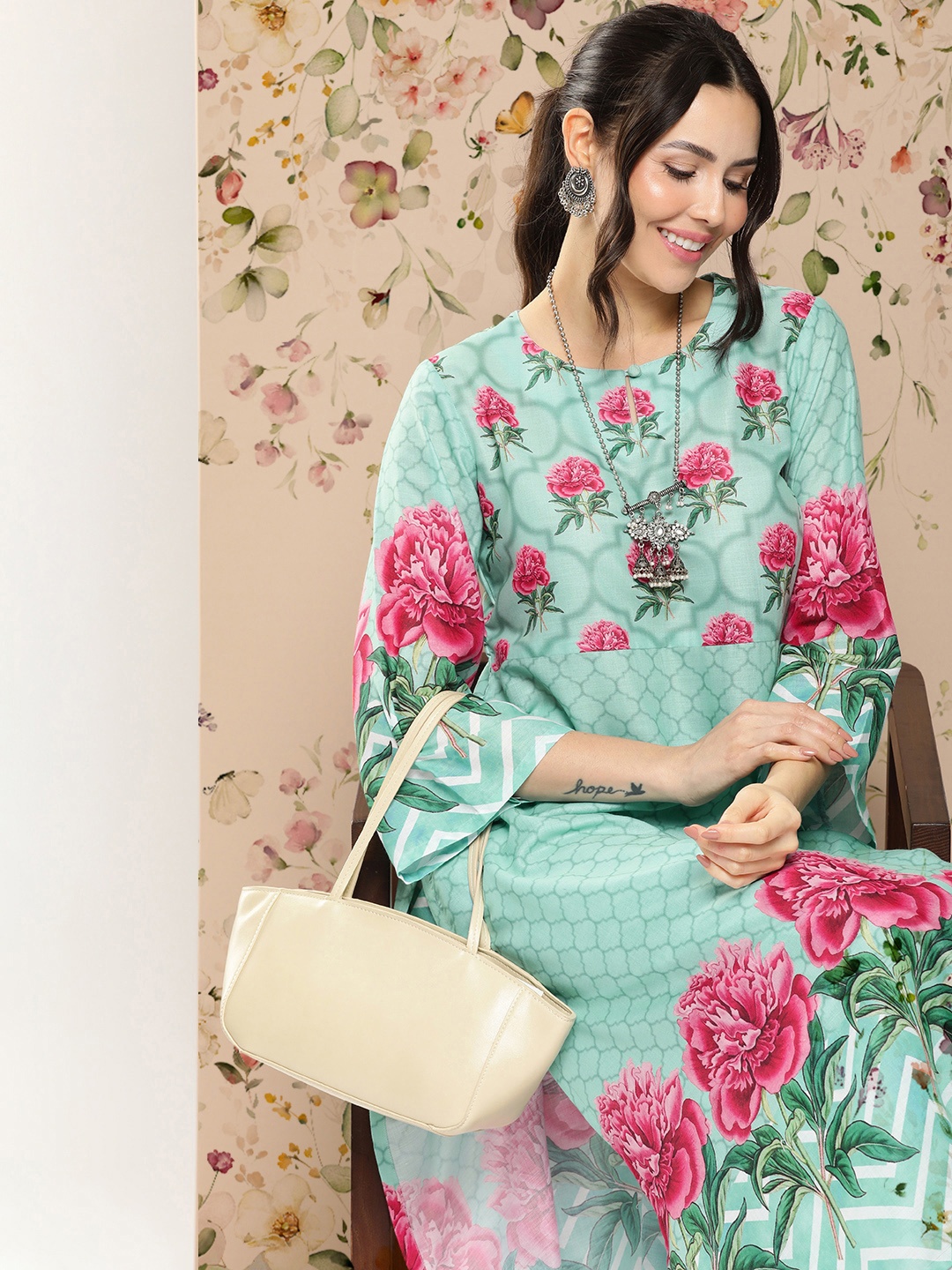 

Bhama Couture Floral Printed Flared Sleeves Kurta With Palazzos, Blue