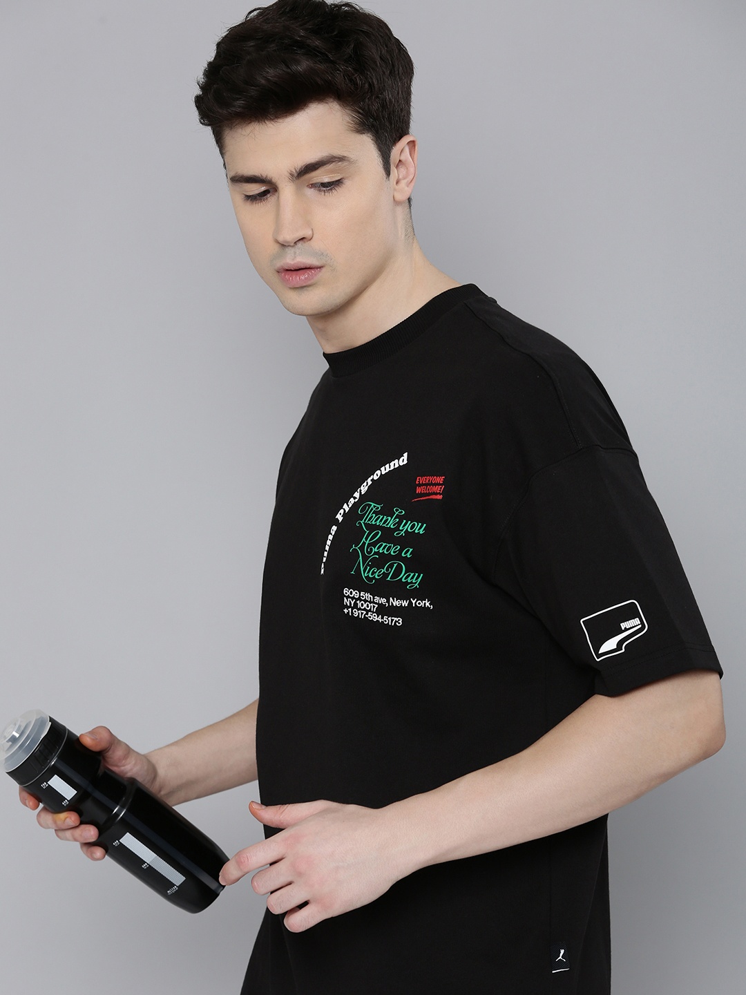 

Puma UPTOWN Unisex Pure Cotton Typography Printed Drop-Shoulder Sustainable T-shirt, Black
