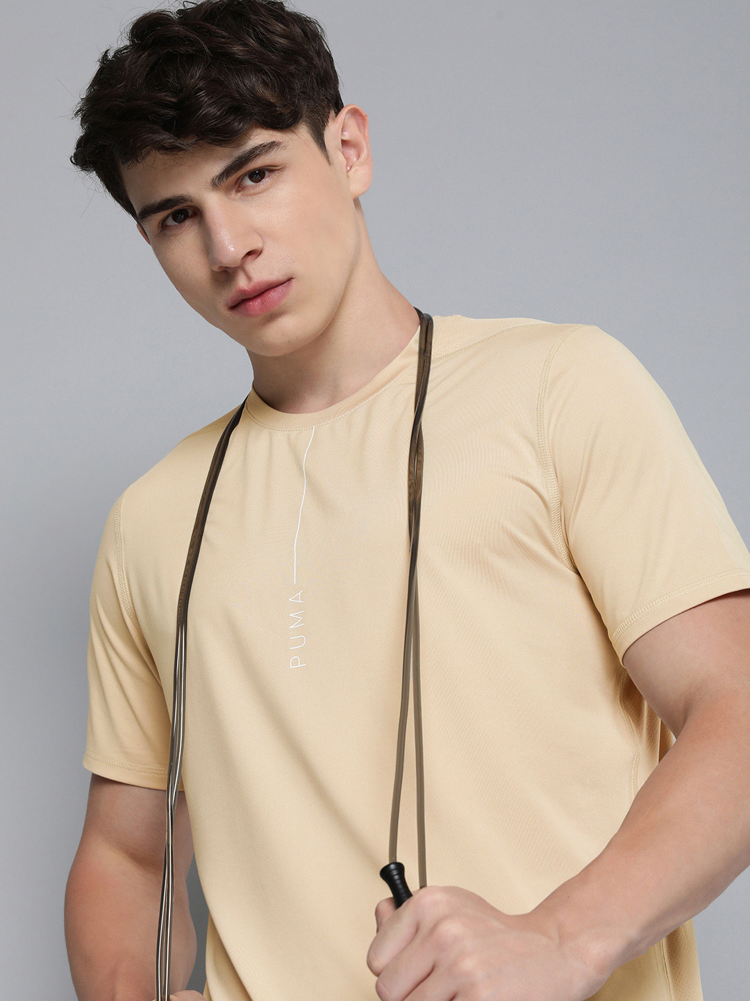 

Puma Men Dry Cell Solid Studio Yogini Lite Training T-shirt, Beige